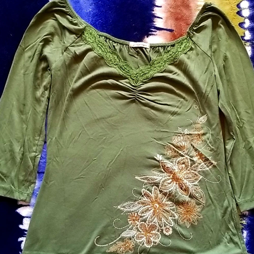 Pretty green embellished blouse